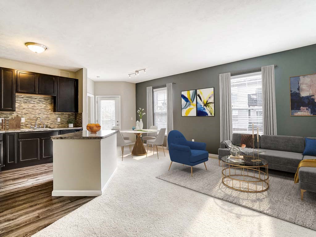 A modern living room with a stone fireplace and a grey sofa.
