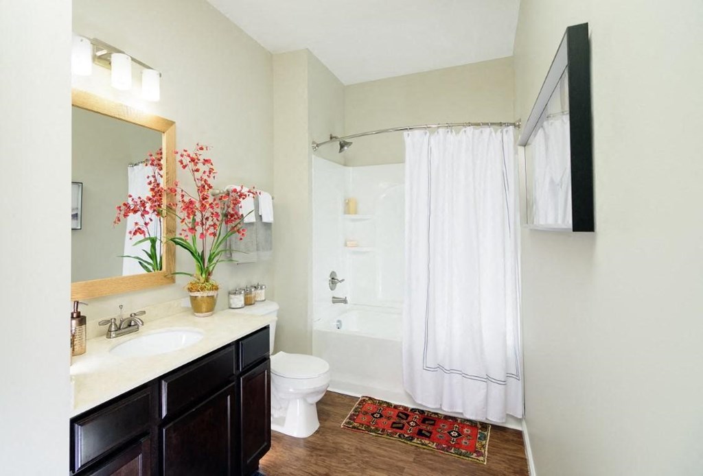 a bathroom with a sink toilet and a shower at Taylor House, Columbus, OH
