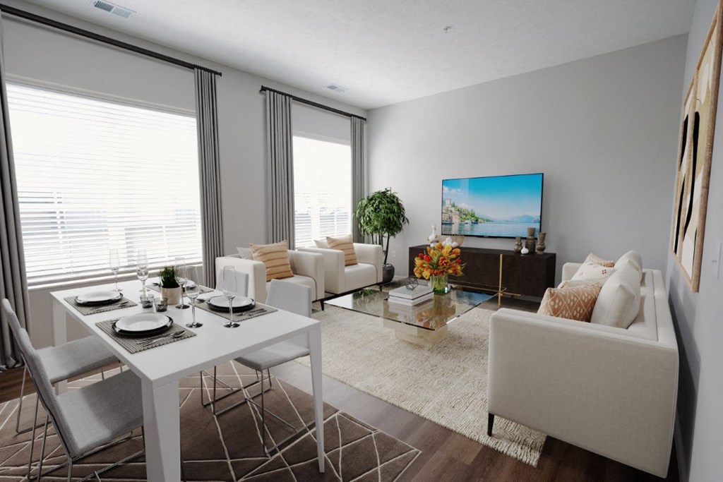 a living room with white furniture and a white table at Kendall Park Too, Ohio