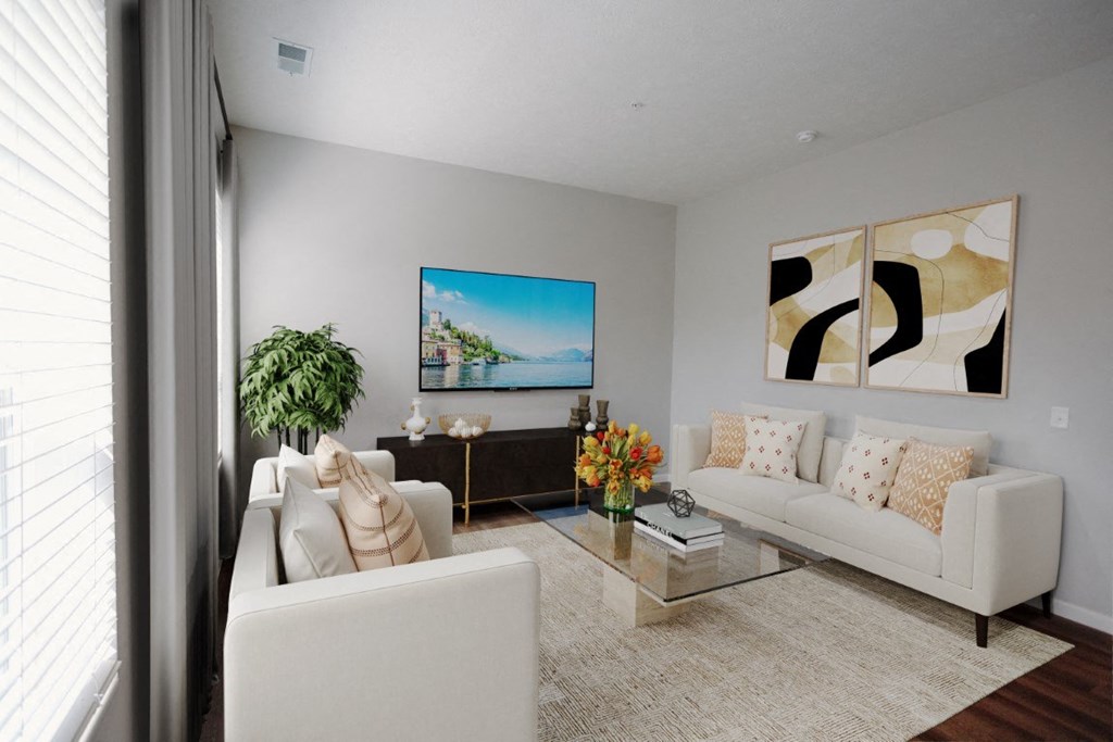 a living room with two white couches and a coffee tableat Kendall Park Too, Columbus