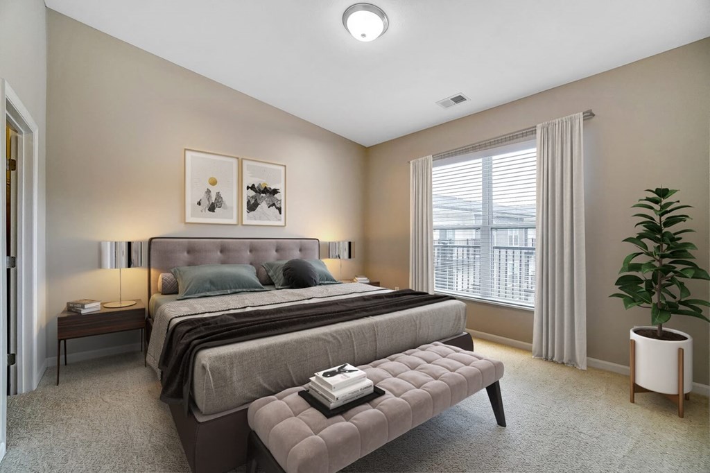 a bedroom with a bed and a window at Taylor House, Columbus, 43214