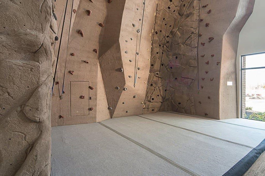 a bedroom with a rock climbing wallat Madison Park Apartments, Ohio, 43214