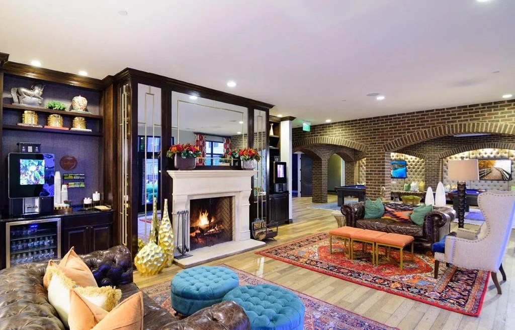a living room filled with furniture and a fire place at Madison Park, Ohio