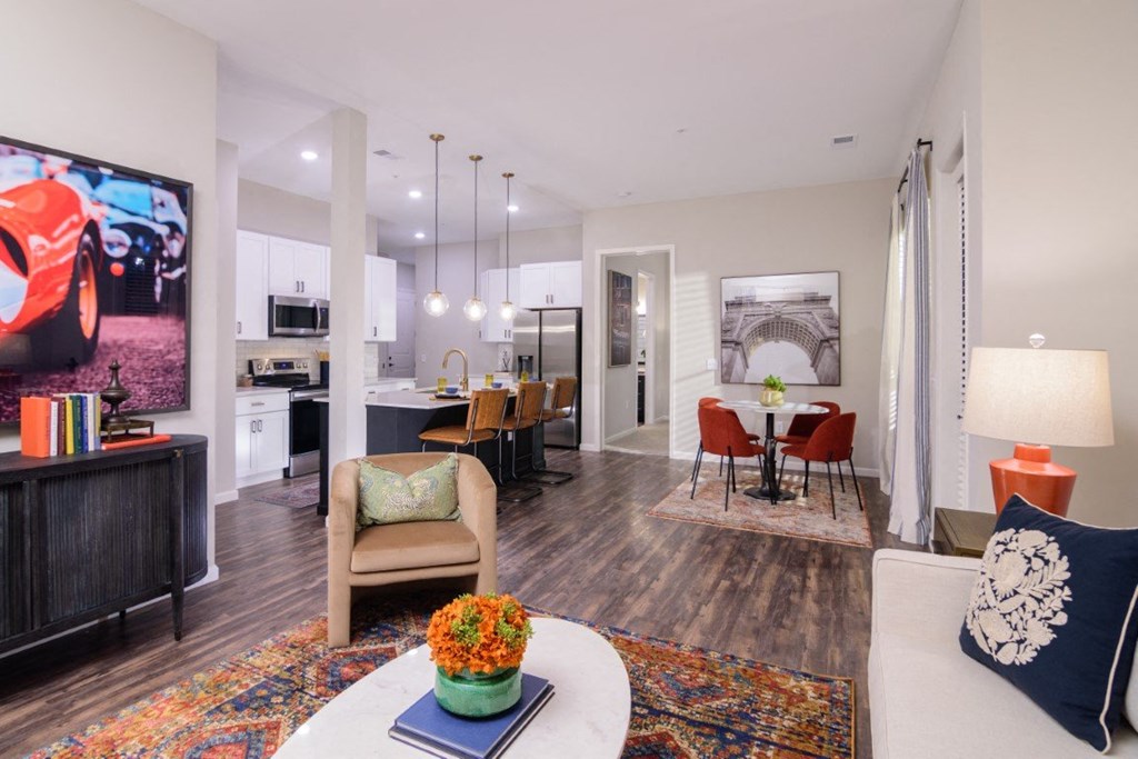a living room and kitchen with a table and chairs at Essex, Columbus, Ohio, 43212