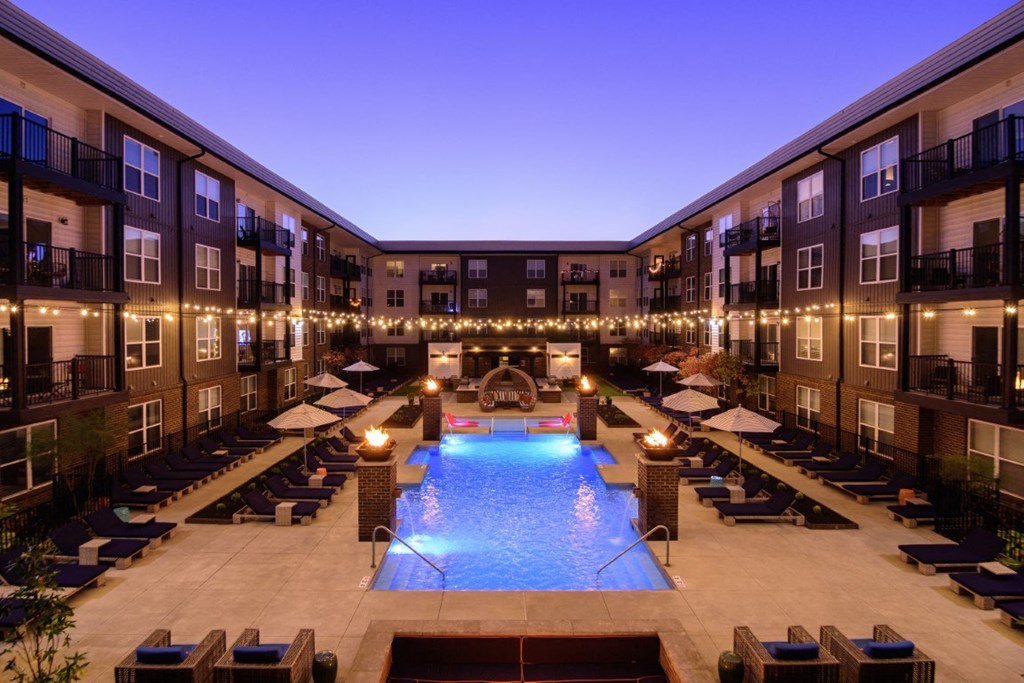 a large pool in the middle of an apartment buildingat Madison Park Apartments, Columbus