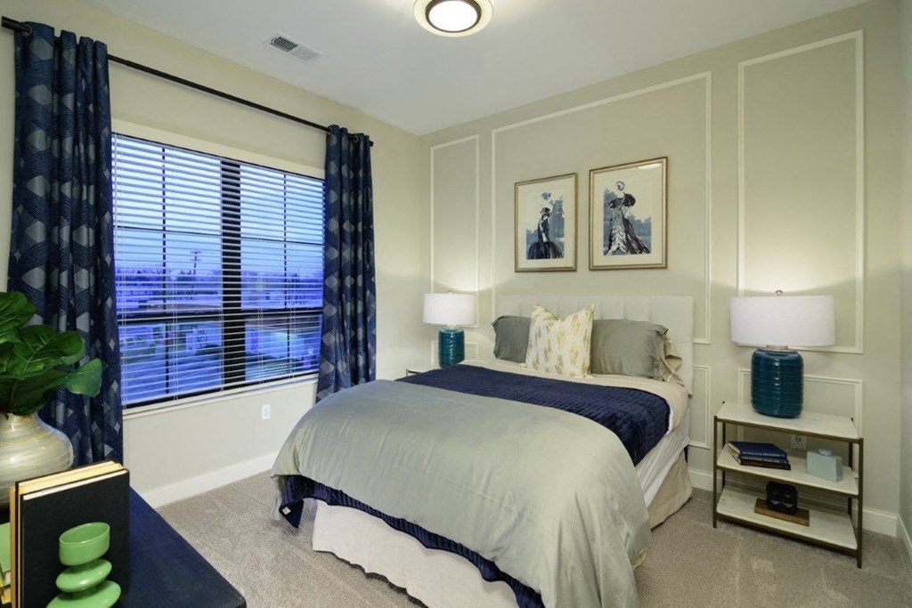 a bedroom with gray walls and a large window with blinds at Fairfax, Ohio, 43212