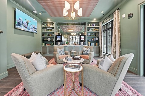 A living room with a grey sofa and a coffee table.
