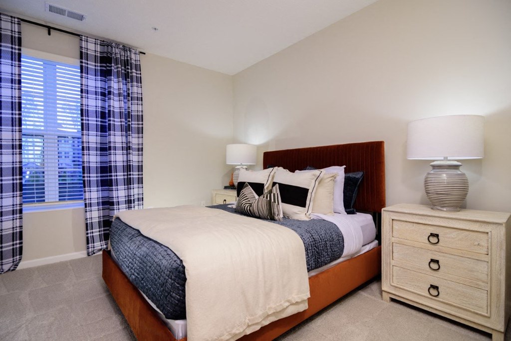 a bedroom with a large bed and a window at Dalton, New Albany Ohio