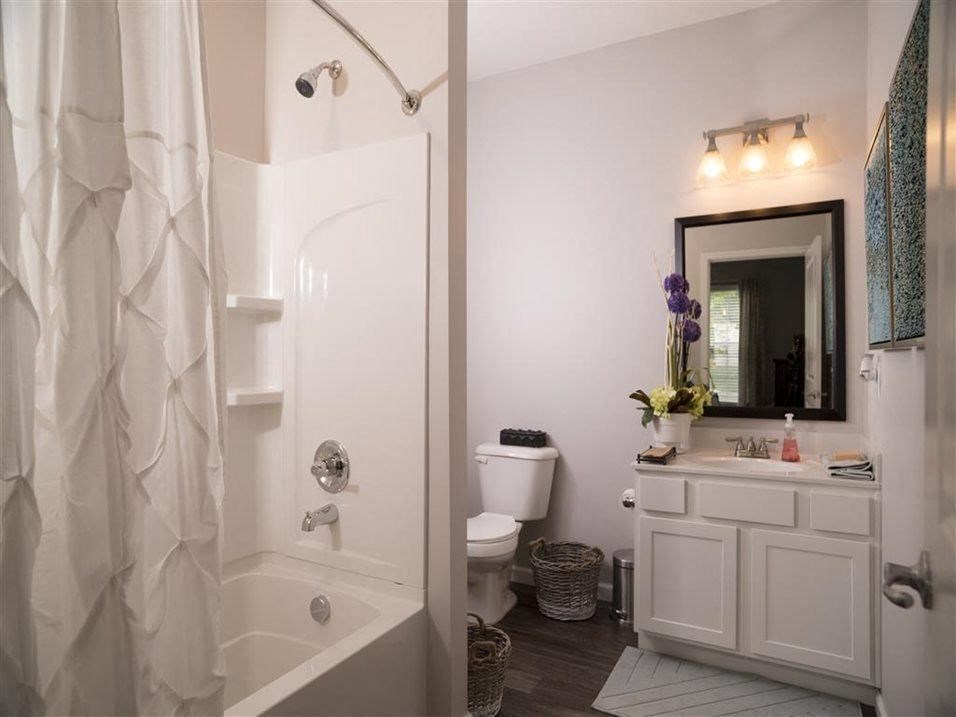 a bathroom with a shower toilet and sink at Kendall Park, Columbus, 43220