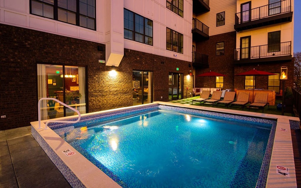 a swimming pool in front of a building at Fairfax, Grandview