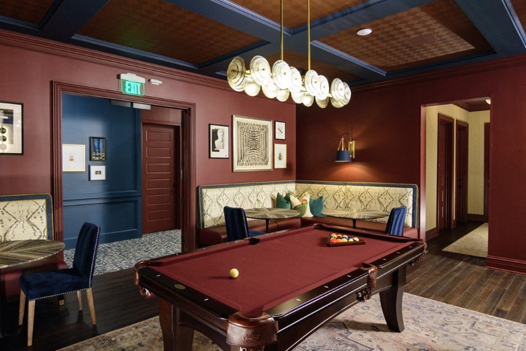 a red pool table in a room with a blue door a red pool table in a room with a blue door at Fairfax, Grandview, 43212