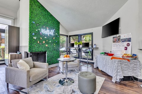 a living room with a green wall and a couch