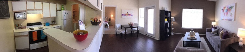 a view of a living room and a kitchen