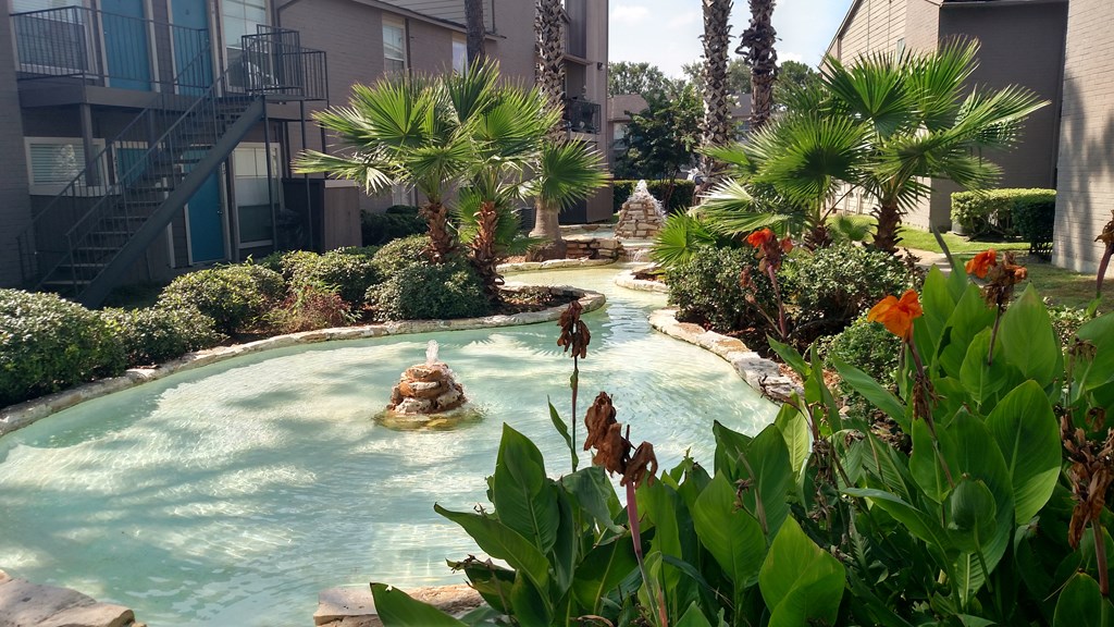 a view of the lazy river at the resort