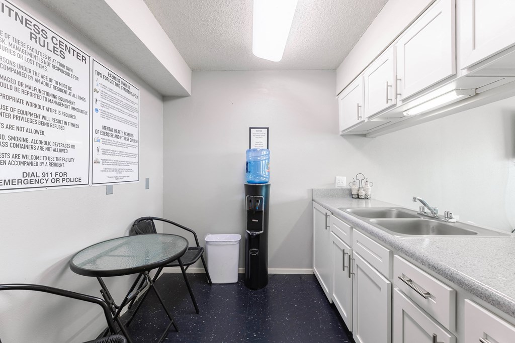 a kitchen with a sink and a table