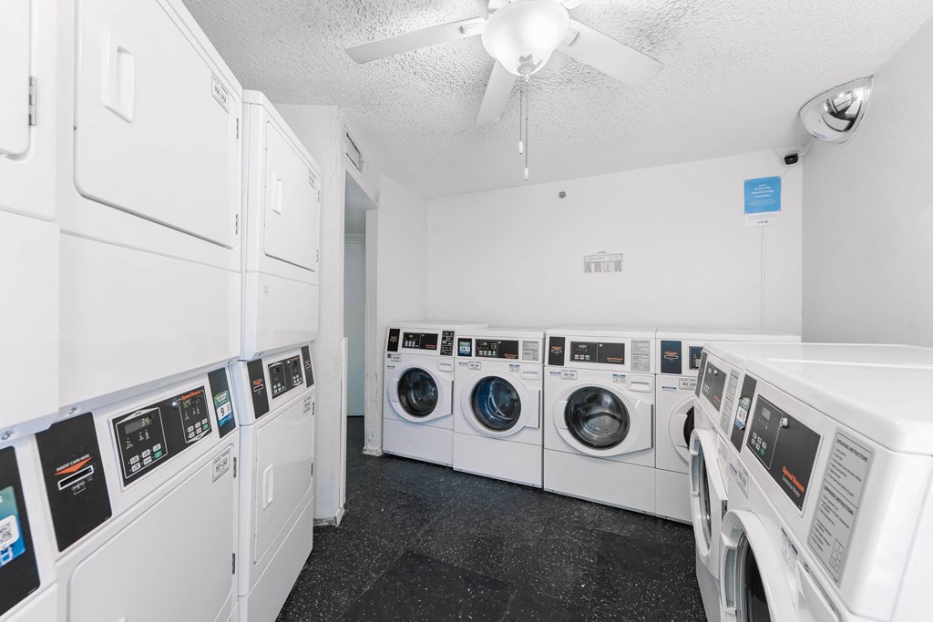 the preserve at ballantyne commons laundry room with washes and dryers