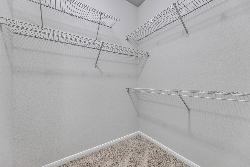 our spacious closets are equipped with shelves and hooks for hanging clothes