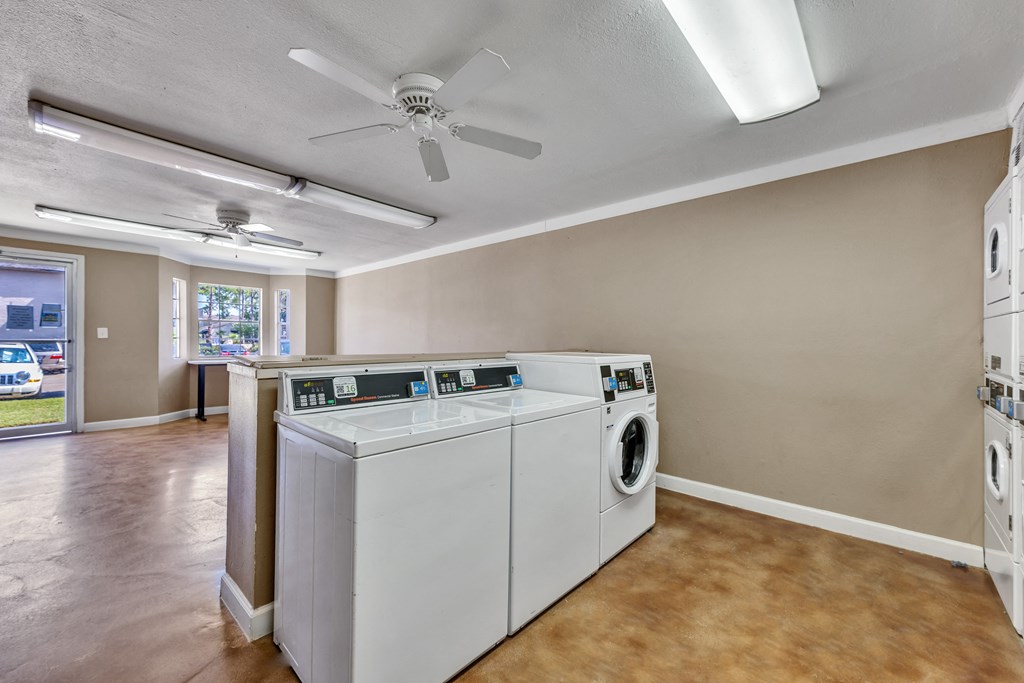 the preserve at ballantyne commons laundry room with washer and dryer