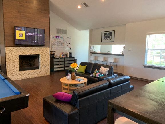 a living room with a couch and a table