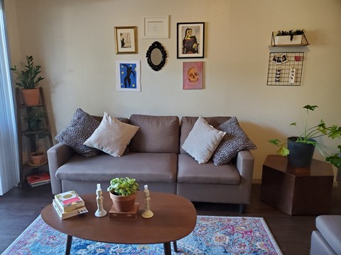 a living room with a couch and a coffee table