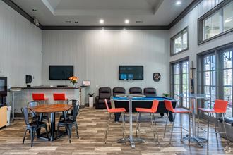 our apartments have a game room with a foosball table and a pool table
