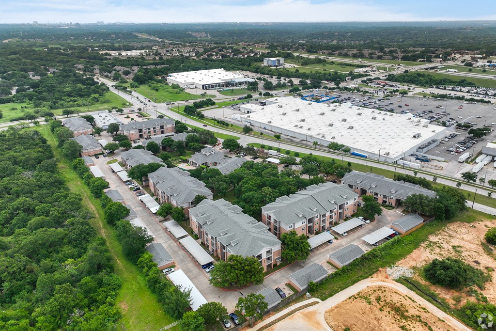 an aerial view of a neighborhood of houses in a city