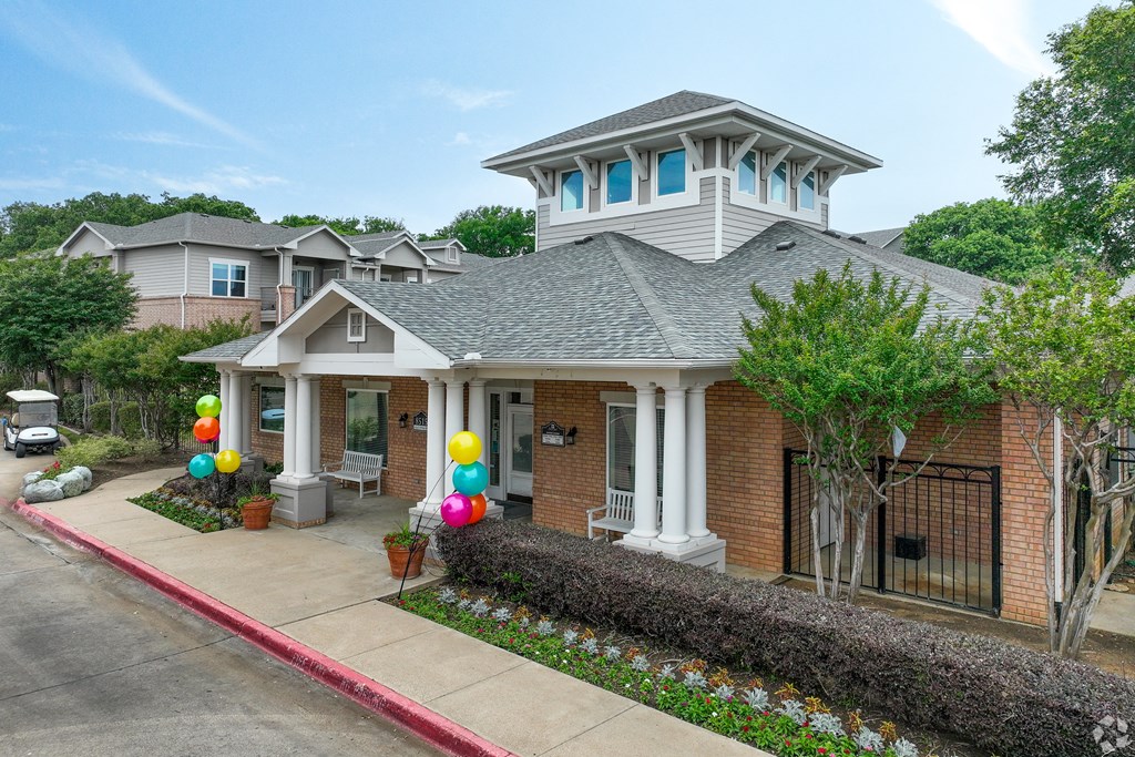 a home with balloons in the front yard