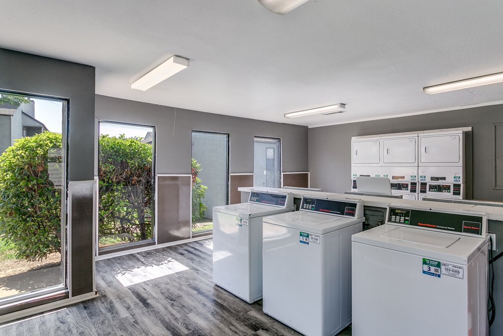 the preserve at ballantyne commons laundry room with washes and dryers