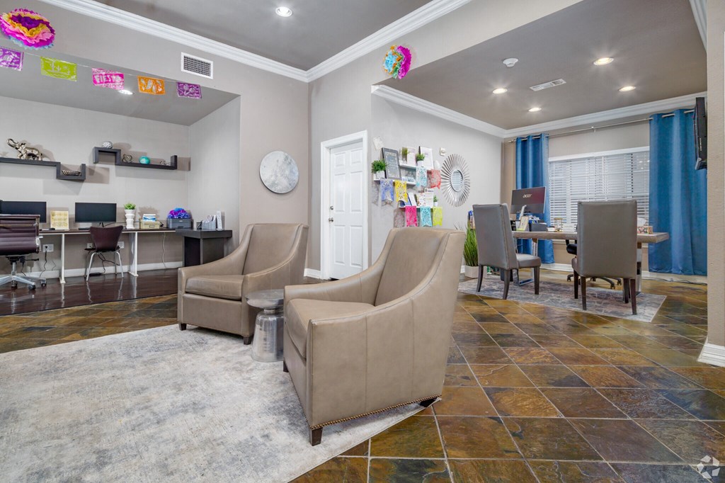 a living room with two couches and a dining room with a table and chairs
