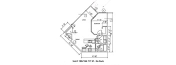 A drawing of a floor plan for a living space with a kitchen and bathroom.