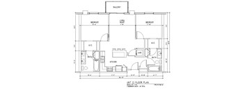 A floor plan of a unit with a living room, two bedrooms, a kitchen, a bathroom, and a laundry area.