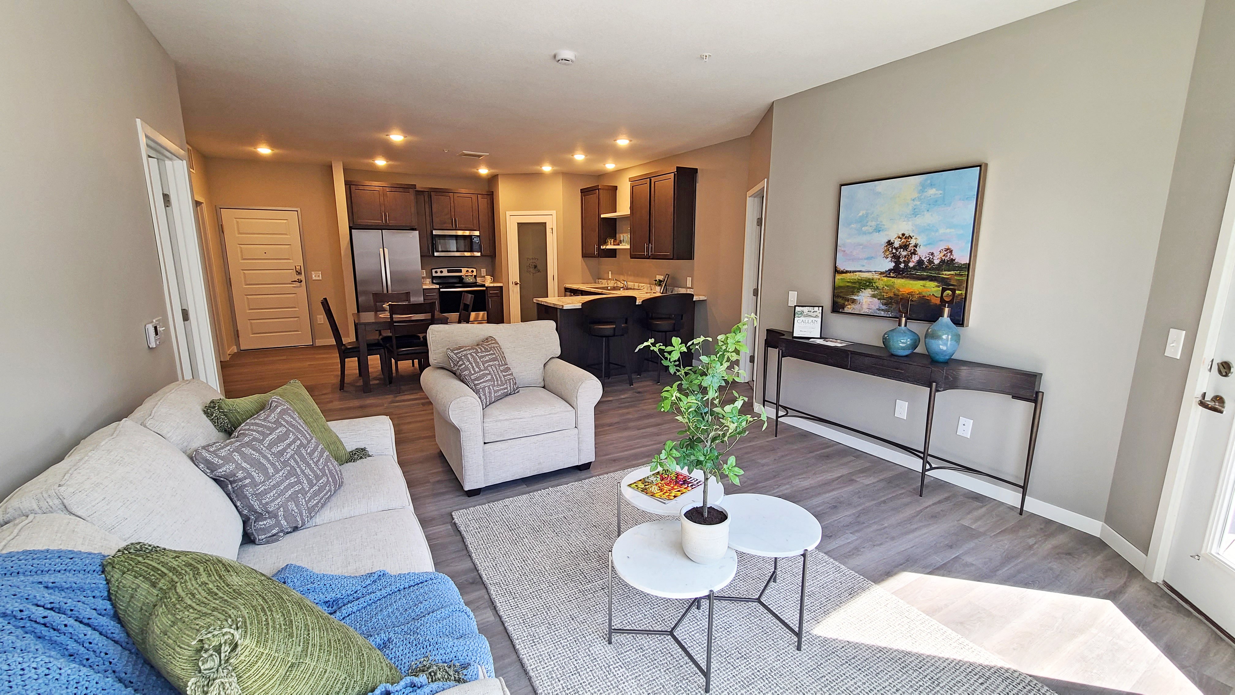 a living room with a couch and a table