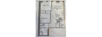 a floor plan of a house with a kitchen and living area