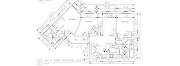 A drawing of a floor plan for a three bedroom apartment.