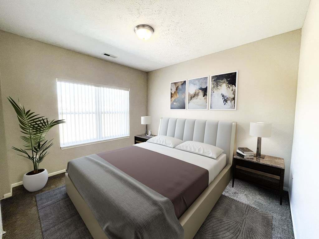 a bedroom with a bed and a plant