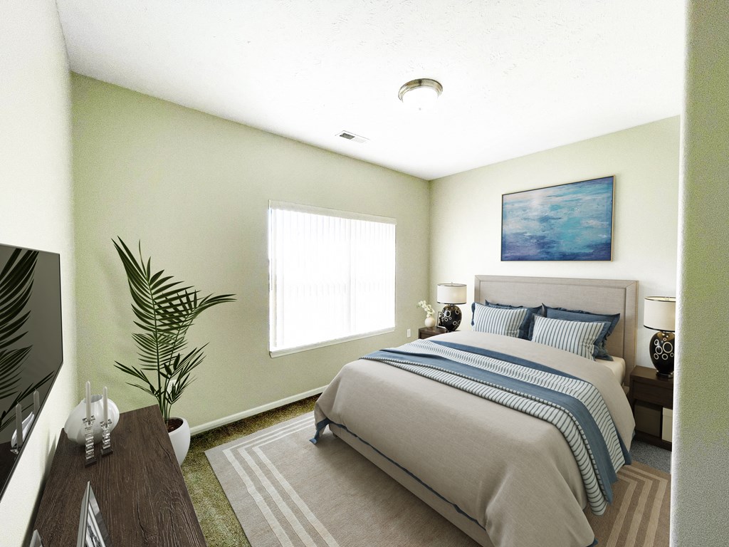 a bedroom with a bed and a large window