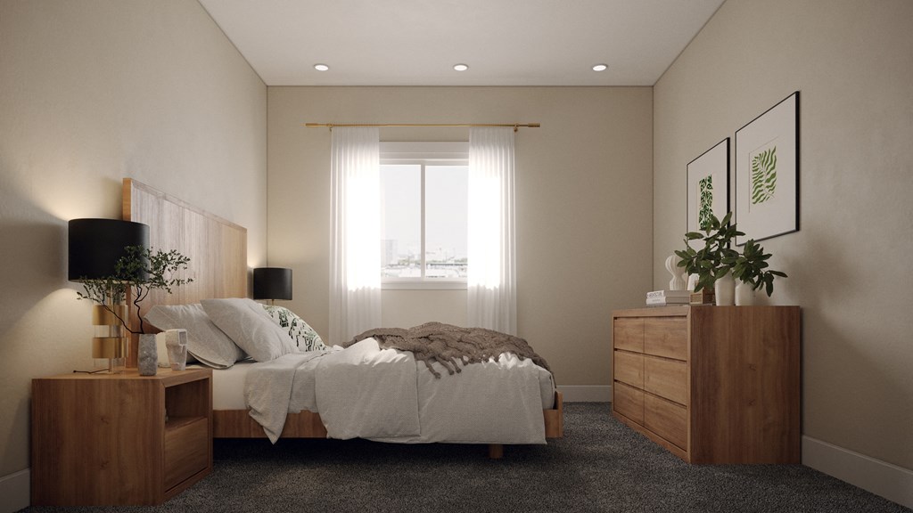 a bedroom with a bed and a dresser and a window