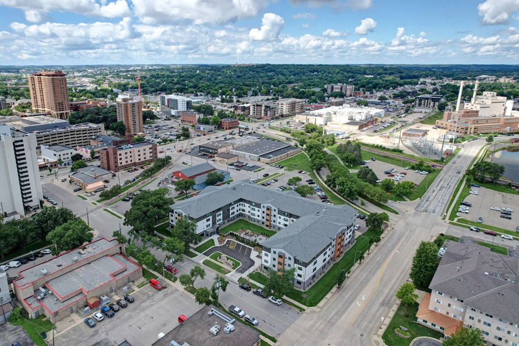A cityscape with a mix of residential and commercial buildings.