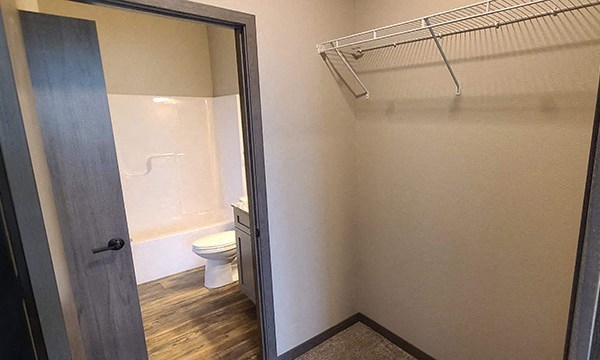 a bathroom with a shower and a toilet in it