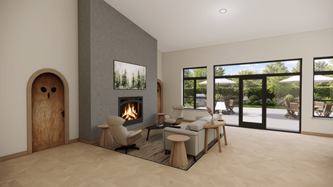 A modern living room with a fireplace and a large window.