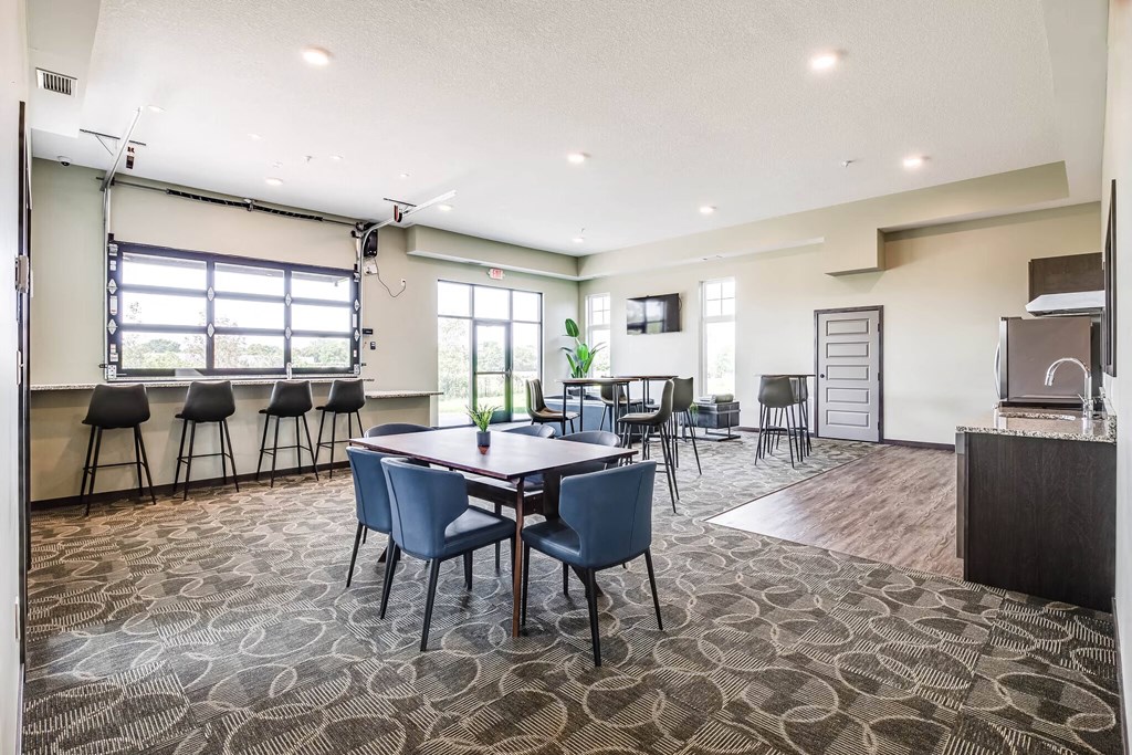 Community room with a table and chairs