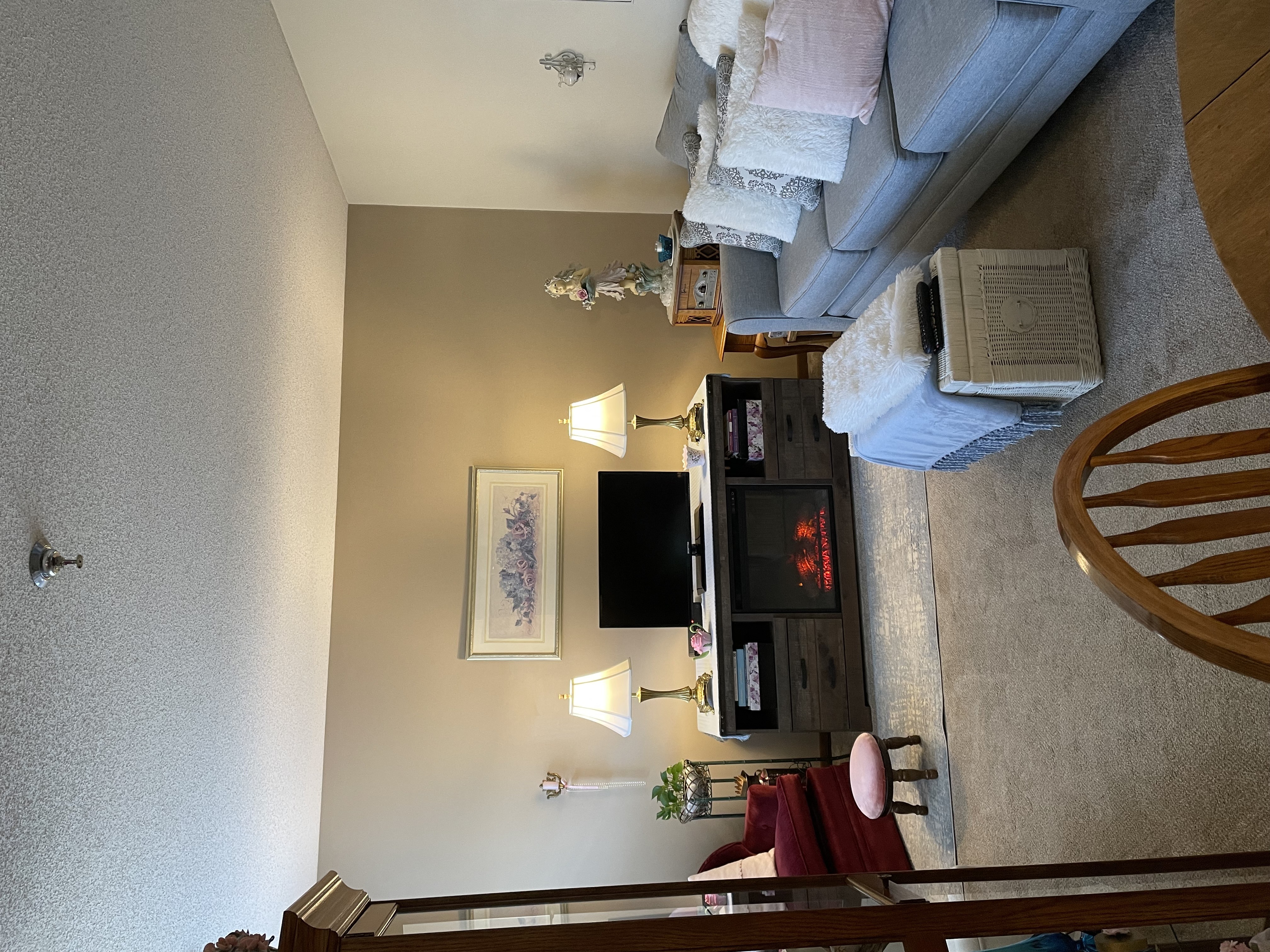 an overhead view of a living room with a couch and a television