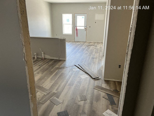 a room that is being renovated with wood floors