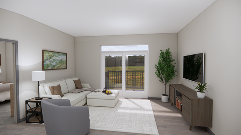 A living room with a grey sofa, a small table with a lamp, a TV on a cabinet, and a window with a view of a fence and trees.
