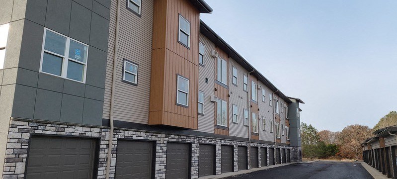 a building with a row of garage doors