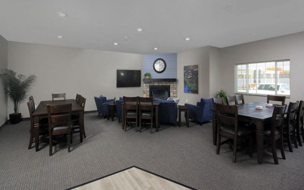 a dining room with tables and chairs in a restaurant