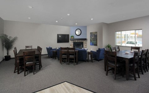 a dining room with tables and chairs in a restaurant