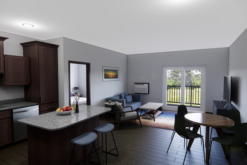 A kitchen with a table and chairs.