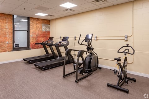 our gym has a lot of exercise equipment for residents to use