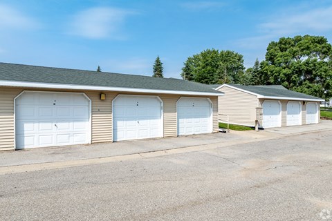 A row of garage doors are closed.